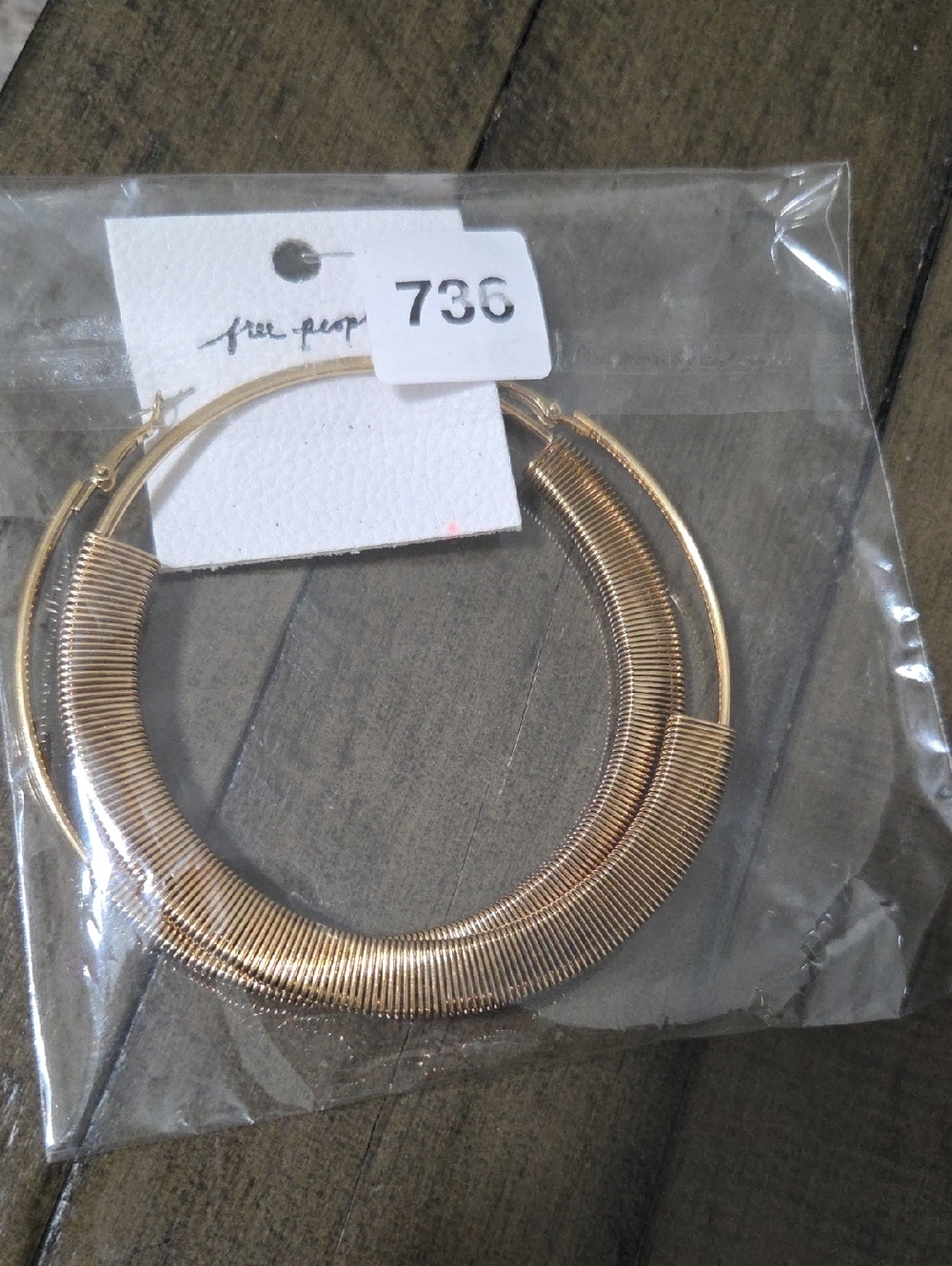 Free People Gold Tone Large Hoop Earrings.